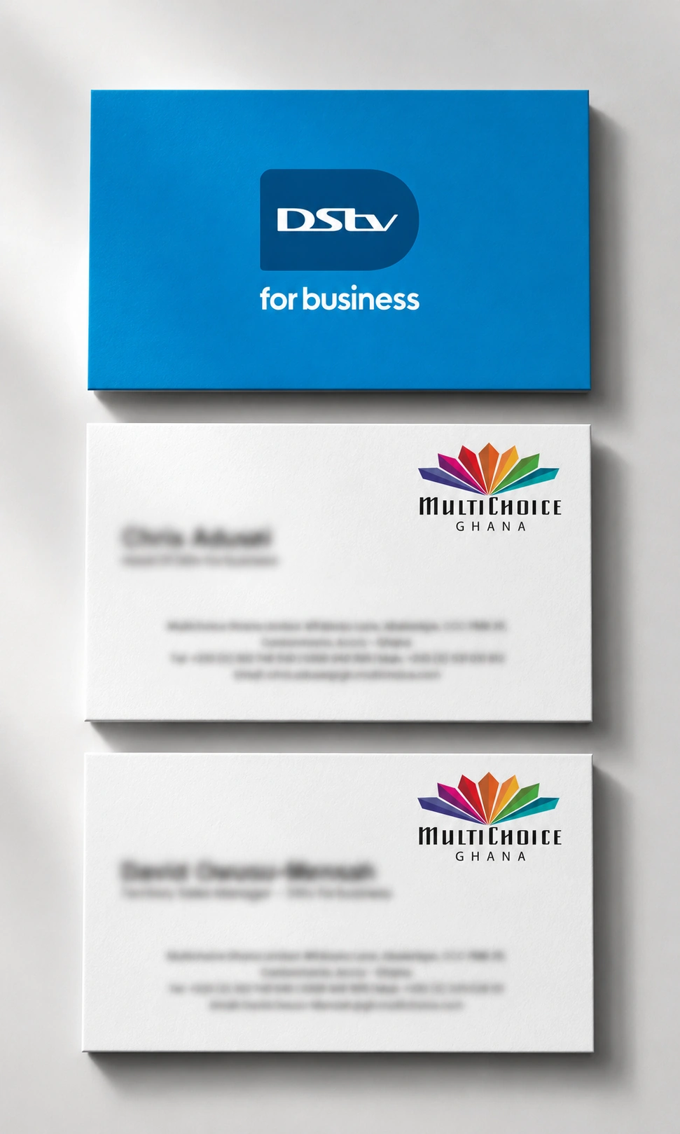 Printed DStv call cards arranged as a branded card mockup